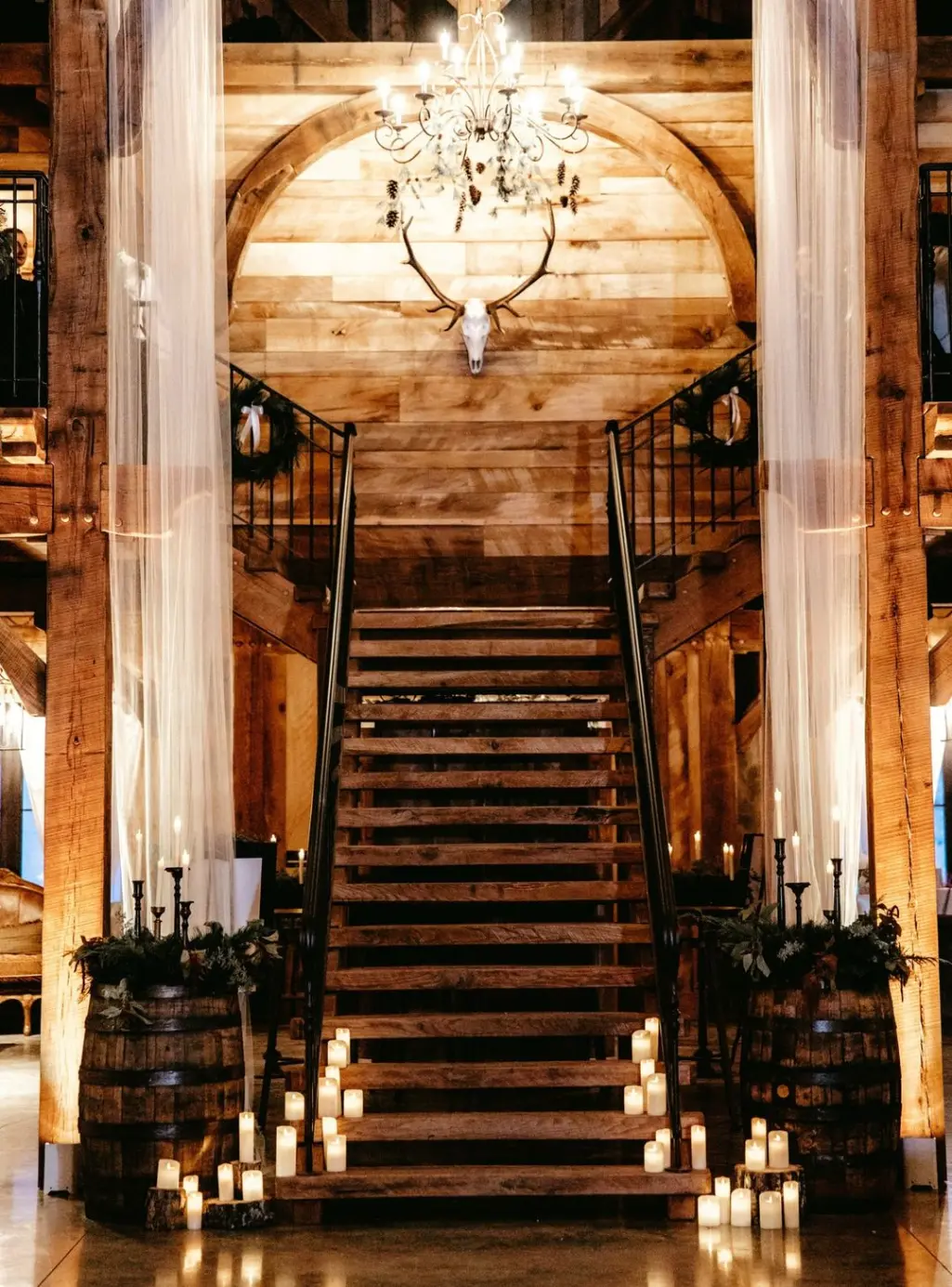 beautiful candles at the stair entrance for winter wedding beautiful candles at the stair entrance for winter wedding